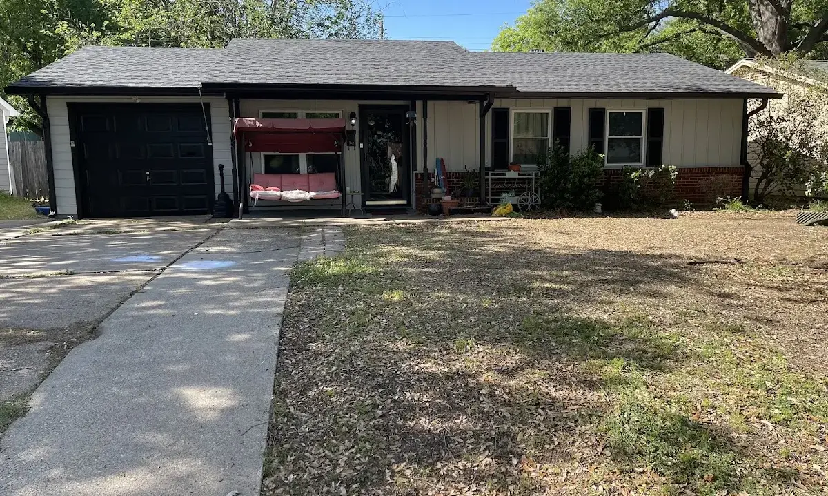 Asphalt Shingle Roof Repair crew at work on a residential roof in Sterling